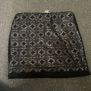 MOVING OUT SALE black pattern skirt